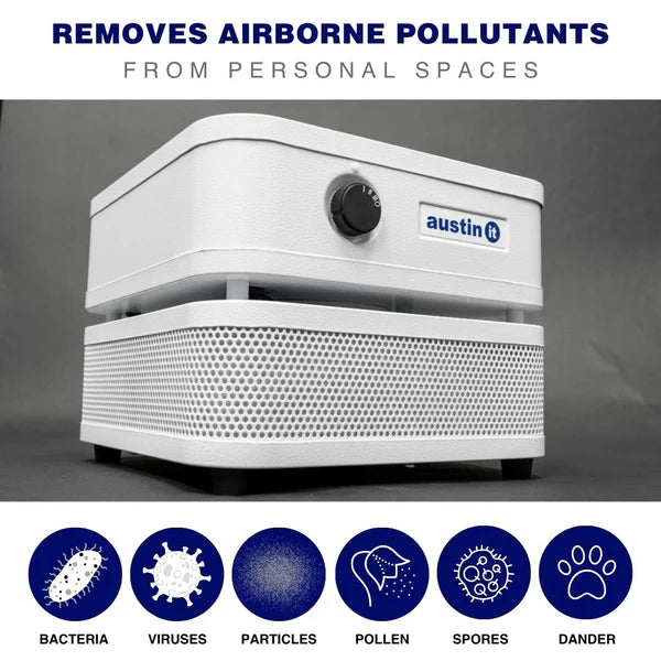 White air purifier with 'Austin' branding on a gray background, featuring text about removing airborne pollutants.